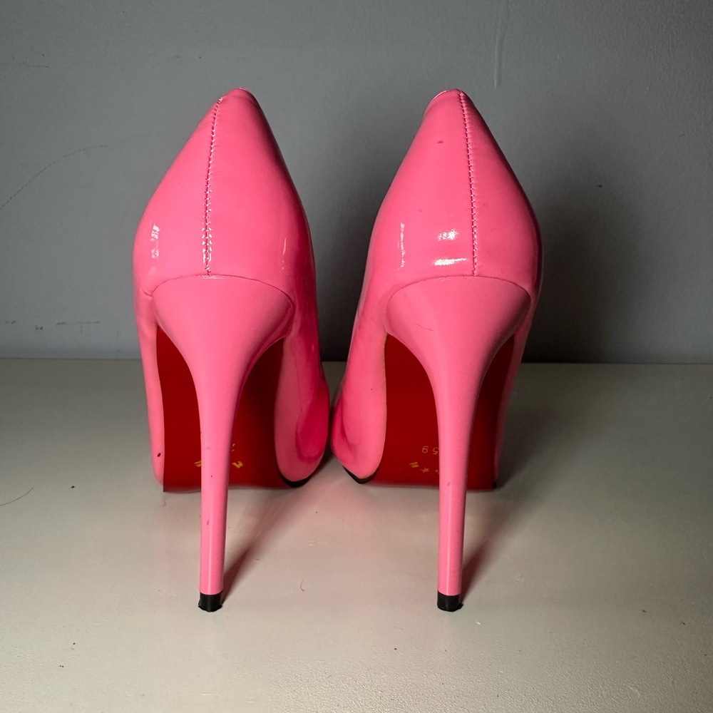 Vibrant Pink Stiletto Heels with Glossy Finish & Red Bottom